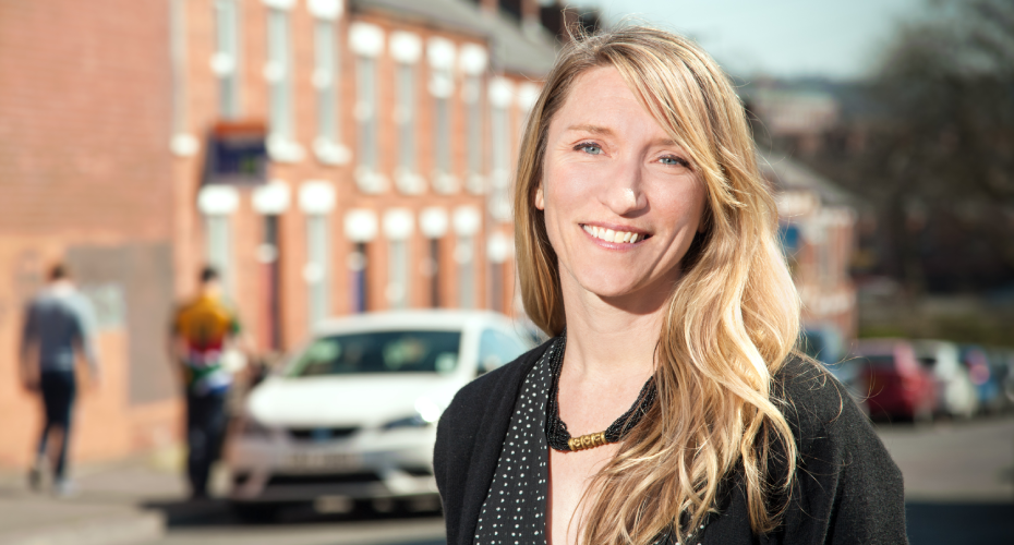 woman looking at the camera and smiling